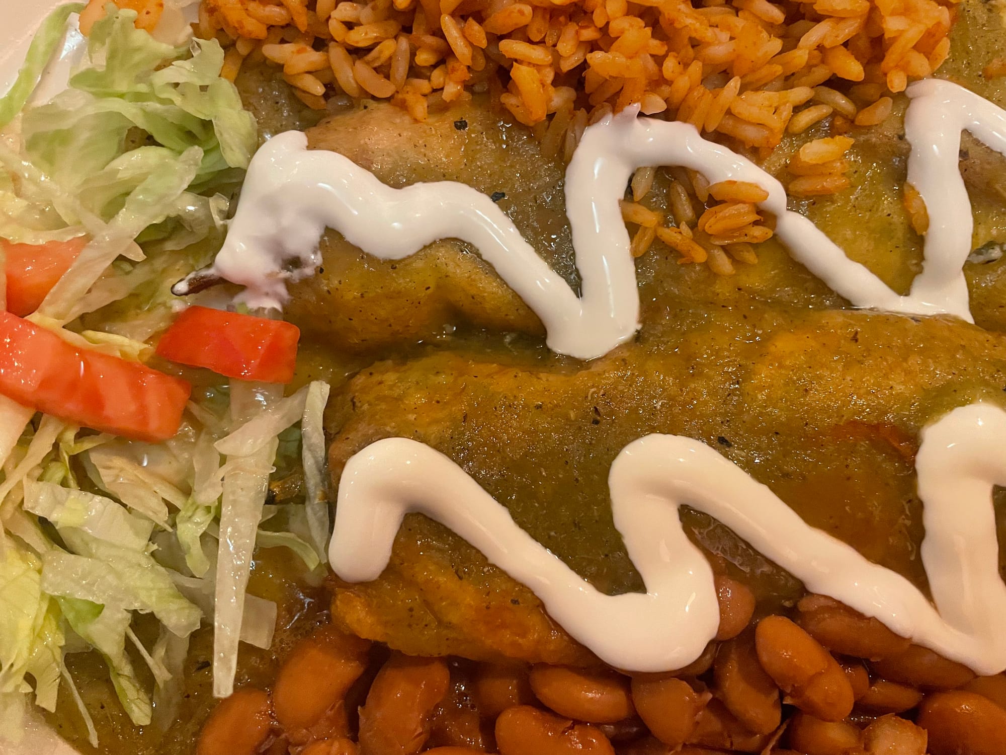 Chile relleno, rice, beans and salad.