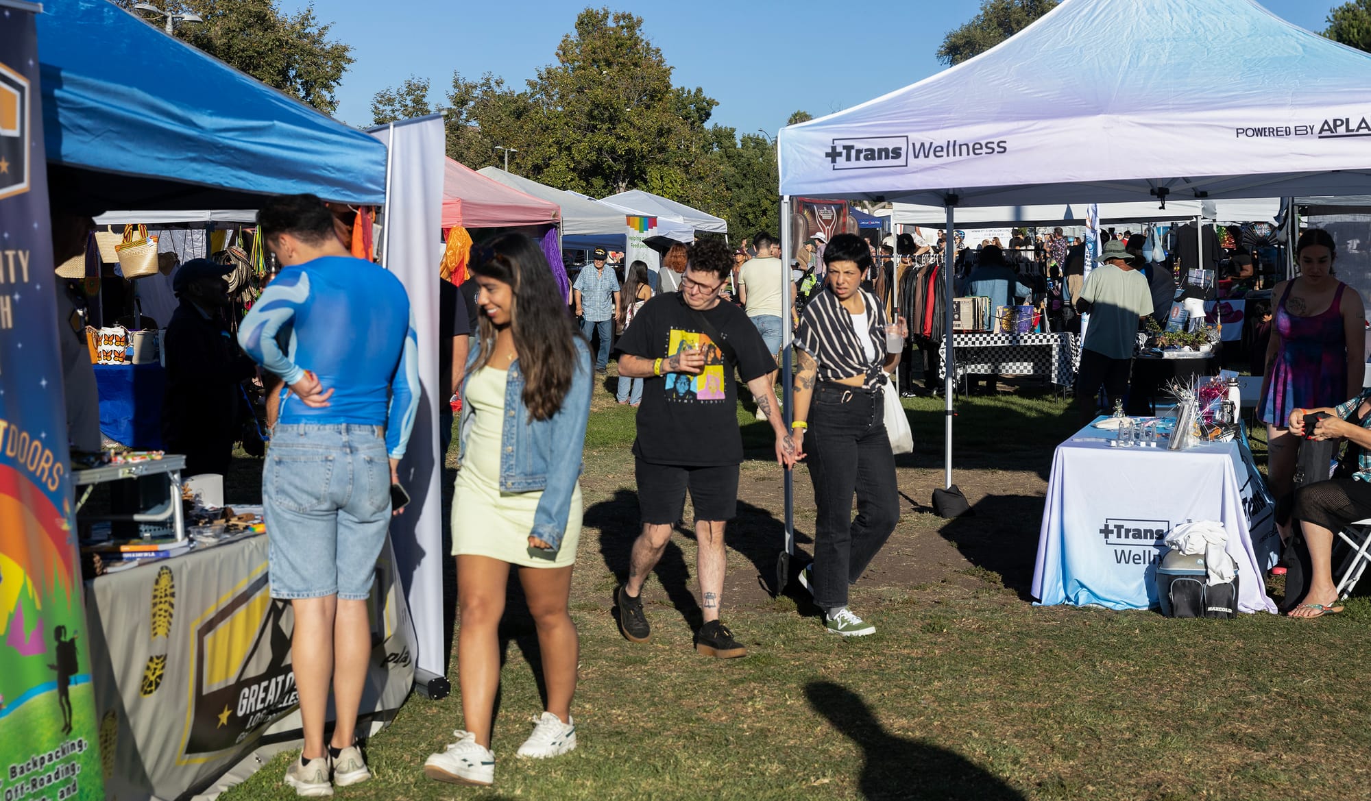 People look at popup vendor shops.