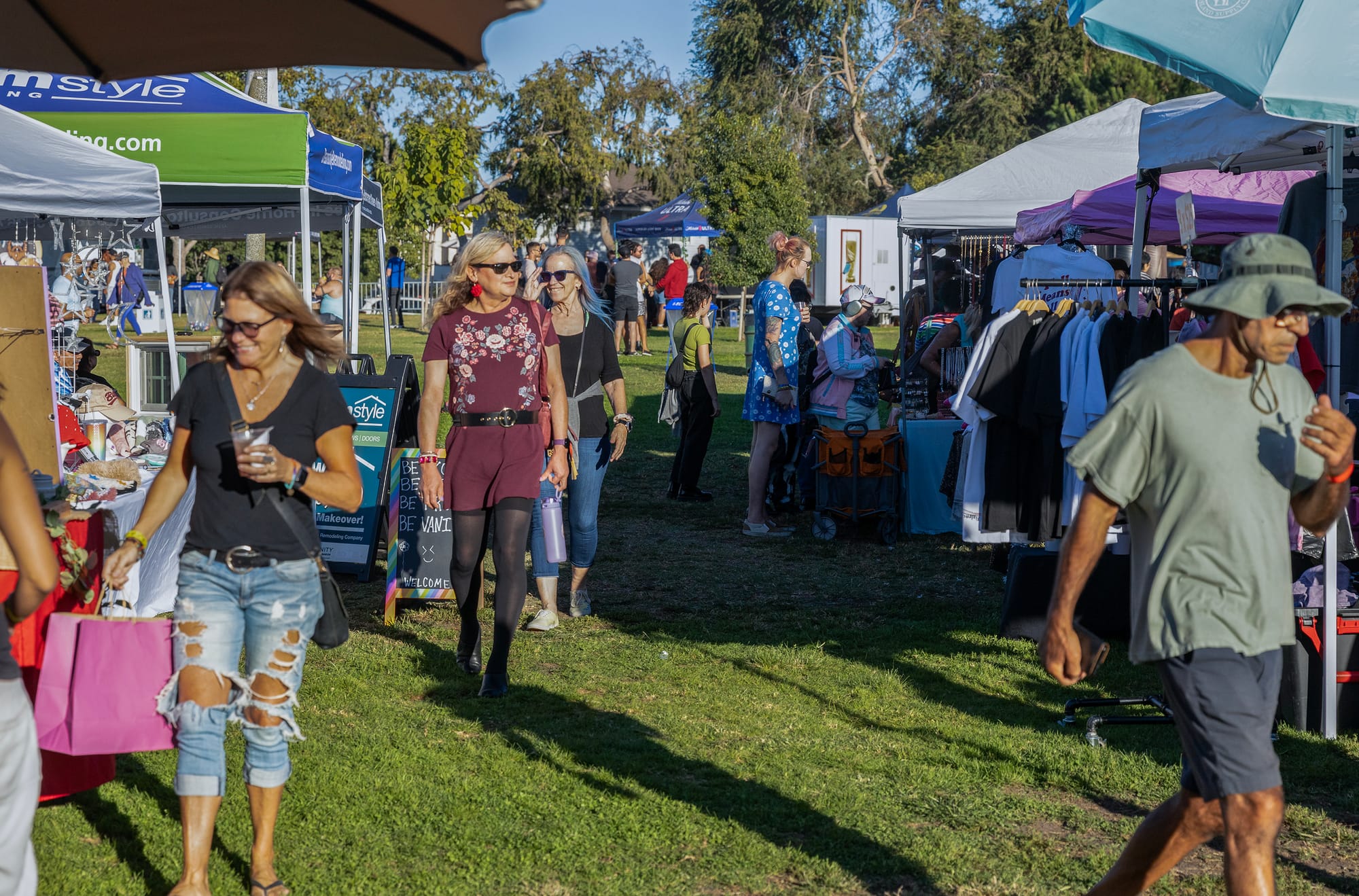 People look at popup vendor shops.