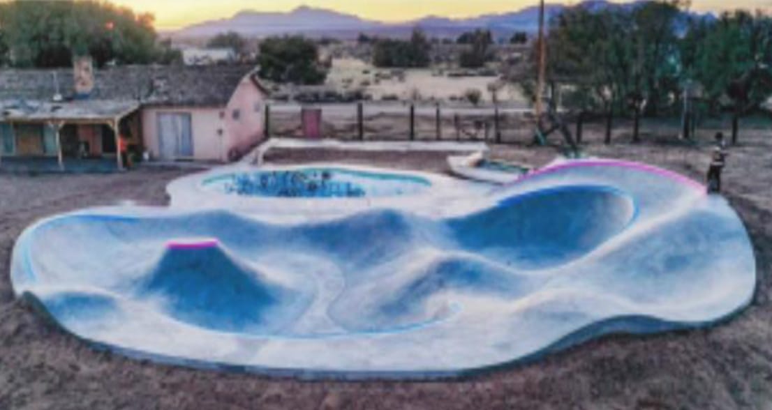 A wavy concrete skatepark.