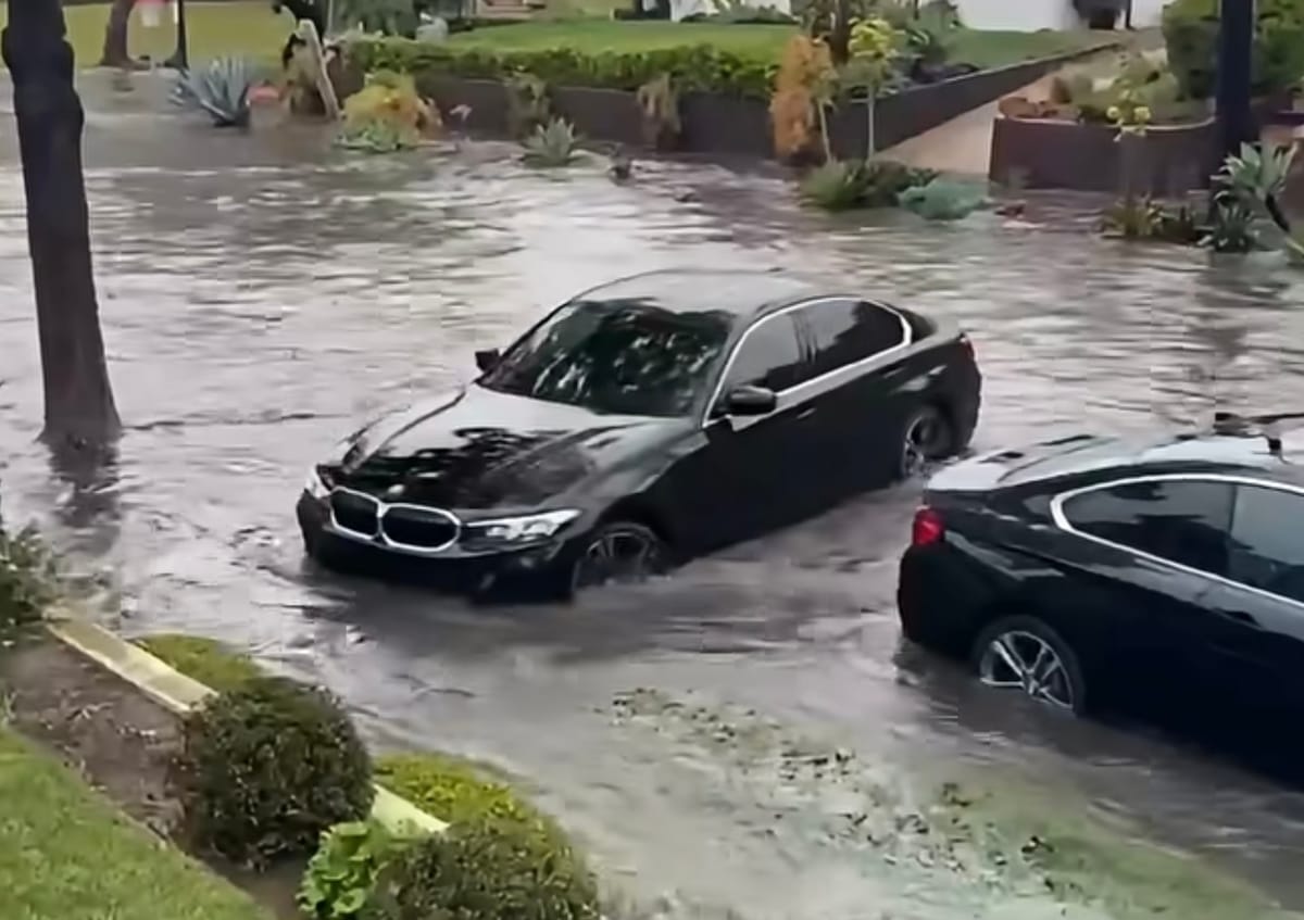 Why does Long Beach flood during rainstorms?
