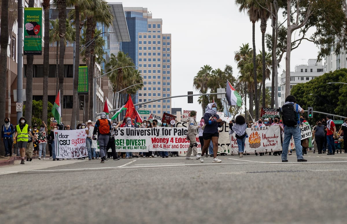 Dozens march in Downtown to demand CSU divest from Israel, stand with Palestinians