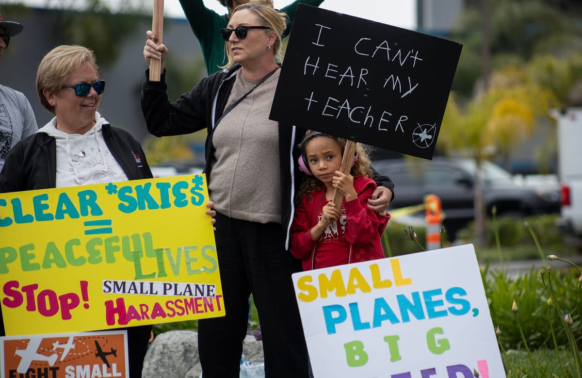 'We're fed up': More than 100 residents protest noise, pollution at Long Beach Airport