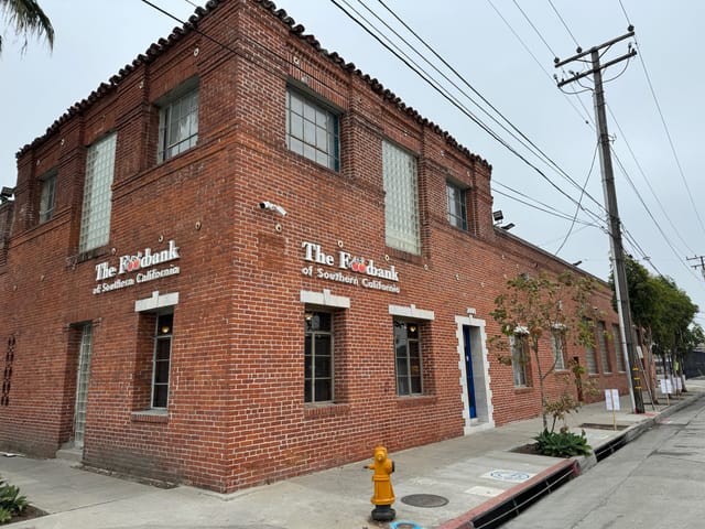 Brick building on a street corner.