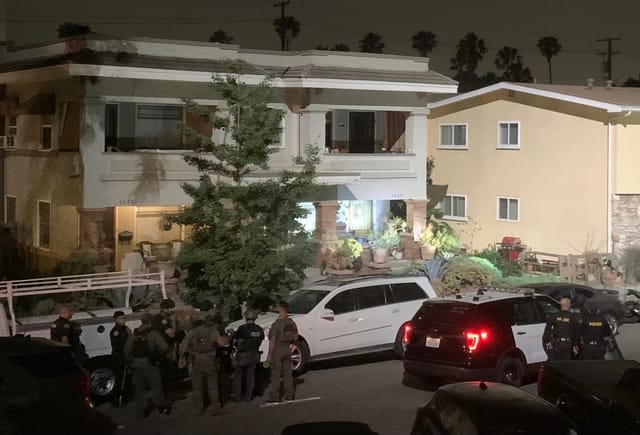 Gunman arrested after holding man hostage at Alamitos Beach apartment, police say